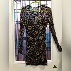 Black and gold lace dress